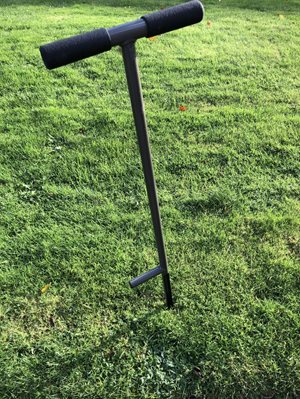 Step probe in grassy area